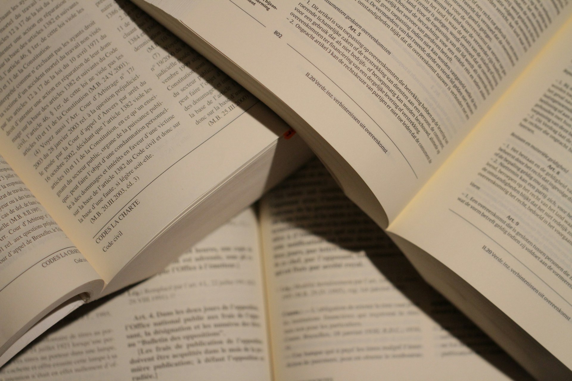 white printer paper on brown wooden table